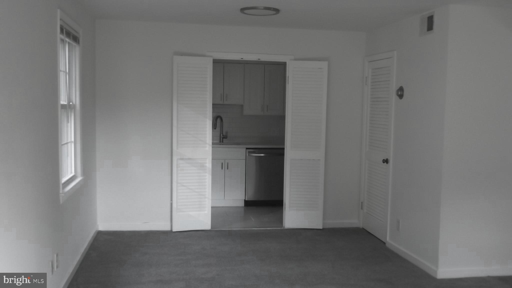 2206 Washington Avenue, Unit 302 Silver Spring, MD 20910 - Photo 7 of 26 a view of an empty room and closet