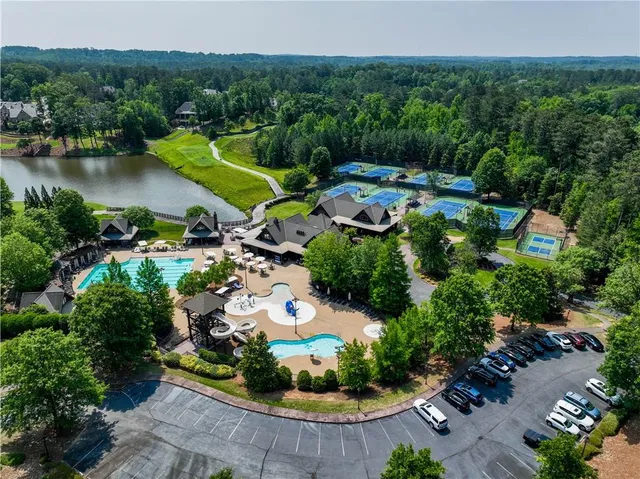 a view of a lake with a yard