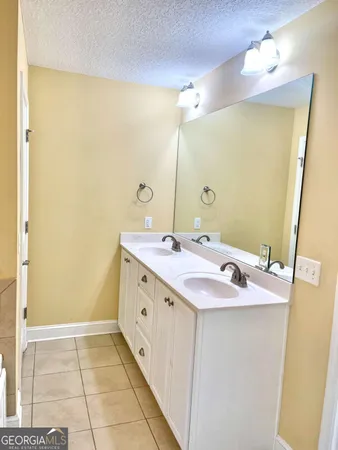 a bathroom with a tub and a shower