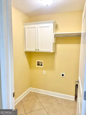 a house with trees in the background