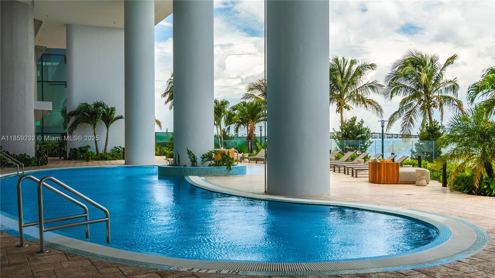700 Northeast 24th Street, Unit 2705 Miami, FL 33137 - Photo 2 of 43 swimming pool view with a potted plant