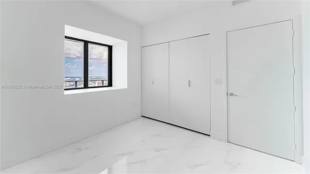 an empty room with a window