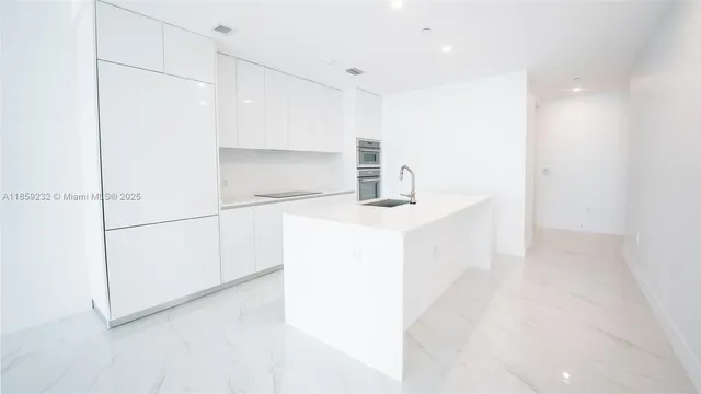 a bathroom with a bathtub and a sink