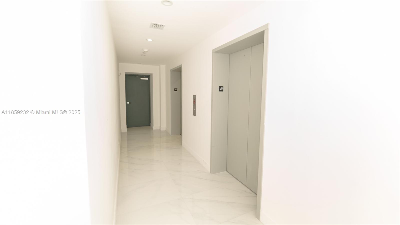 700 Northeast 24th Street, Unit 2705 Miami, FL 33137 - Photo 43 of 43 a view of a hallway
