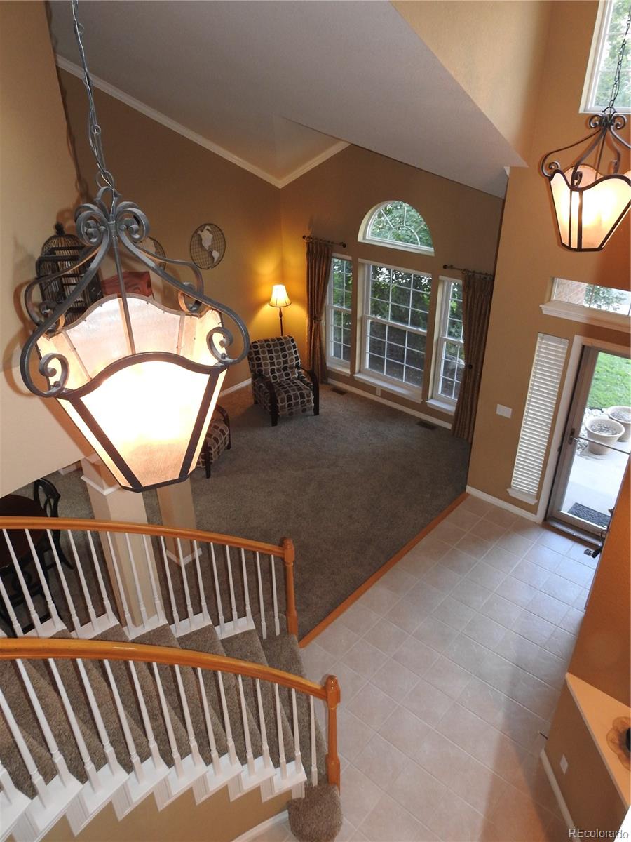 455 West Angus Way Highlands Ranch, CO 80129 - Photo 19 of 27 a view of a livingroom with furniture and staircase
