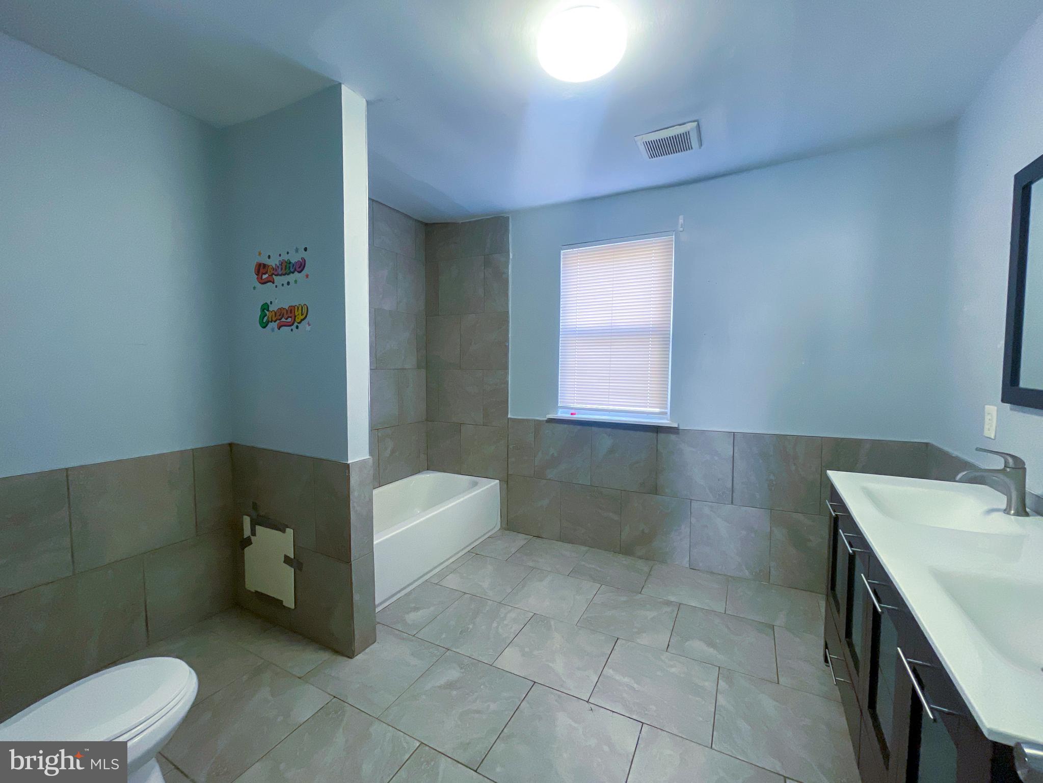 2113 Mountain Street Philadelphia, PA 19145 - Photo 21 of 38 a bathroom with a sink and a toilet
