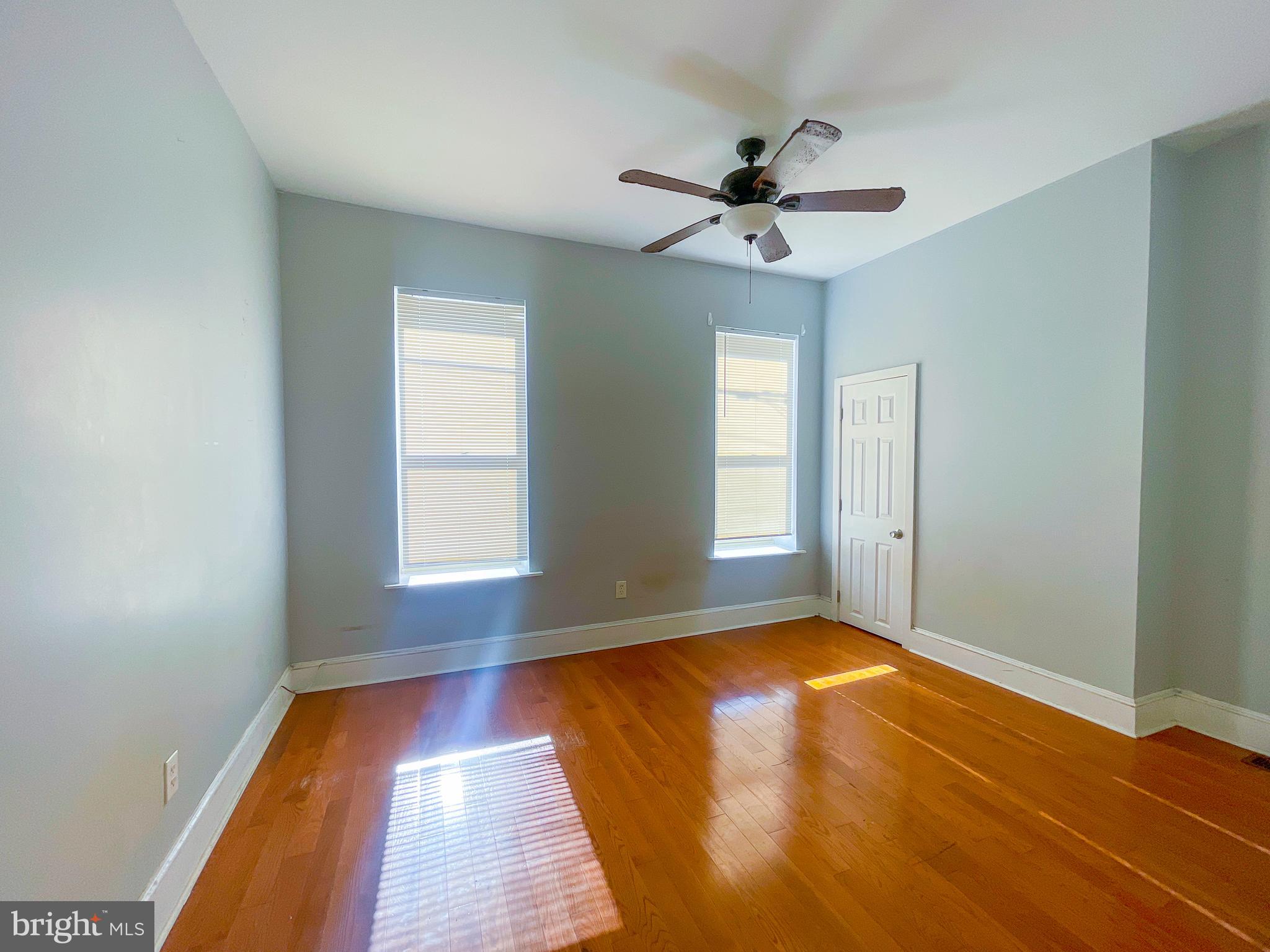 2113 Mountain Street Philadelphia, PA 19145 - Photo 30 of 38 a view of empty room with wooden floor and fan