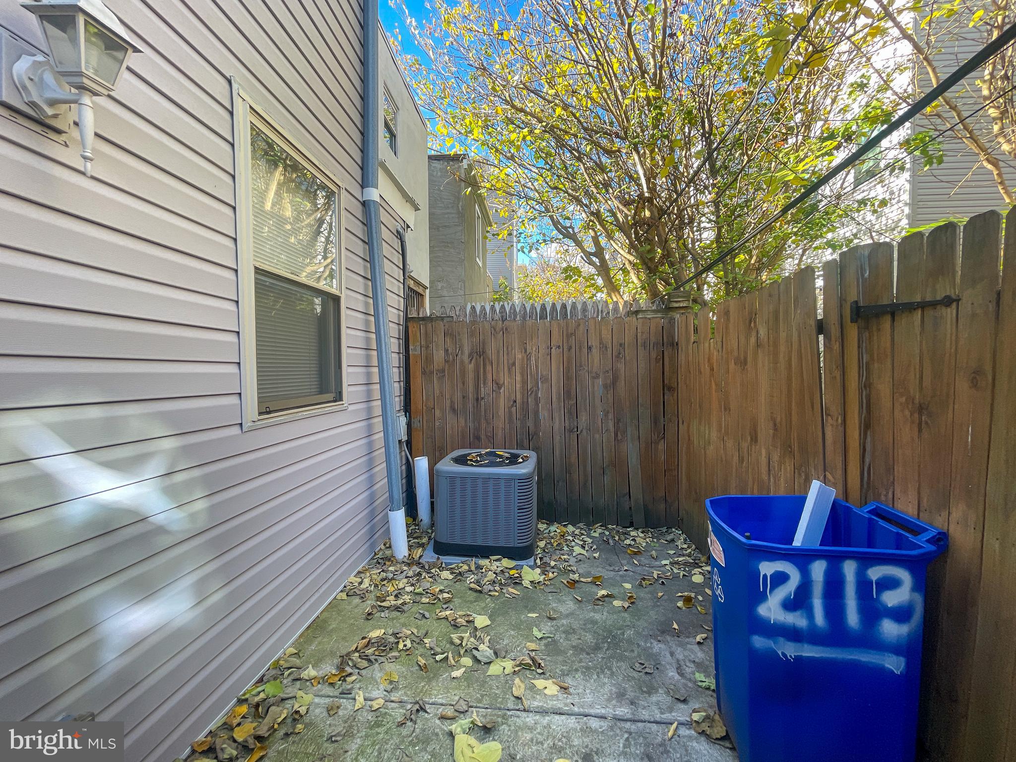 2113 Mountain Street Philadelphia, PA 19145 - Photo 36 of 38 a view of a house with a chairs in patio