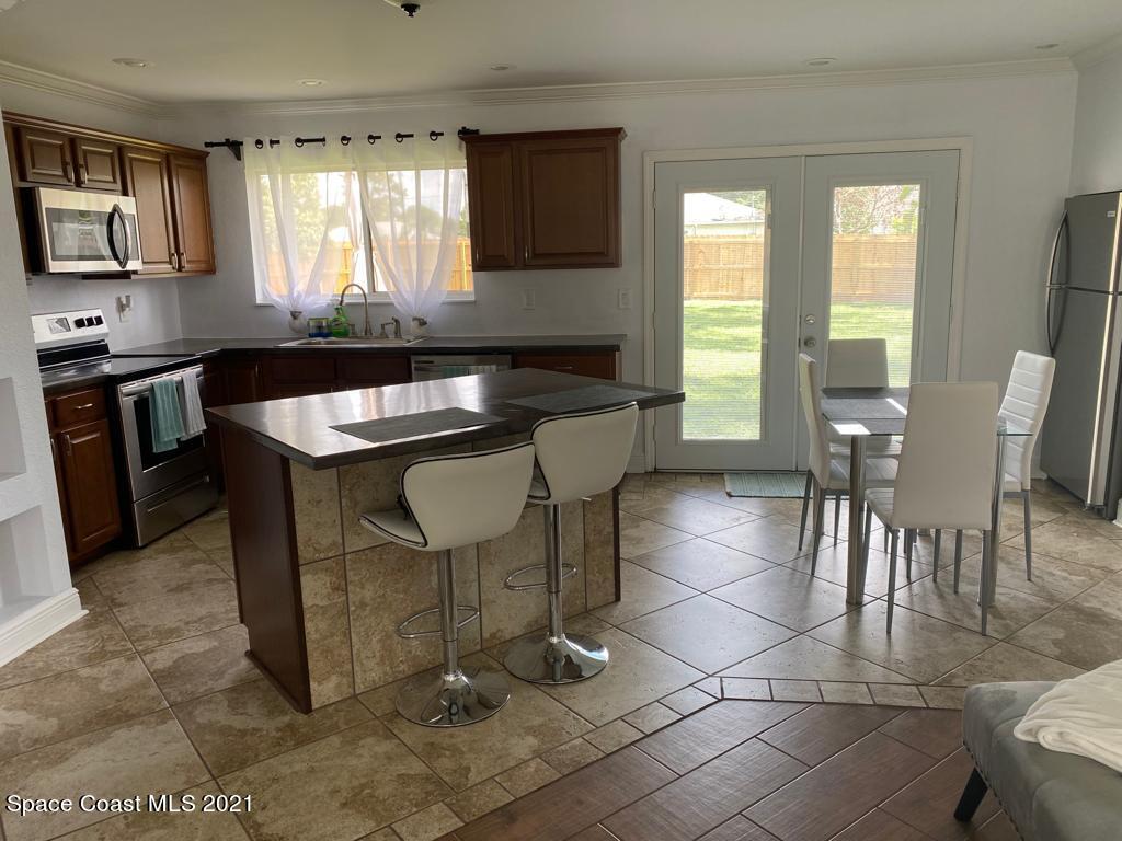597 Nackman Road Northwest Palm Bay, FL 32907 - Photo 4 of 12 kitch2