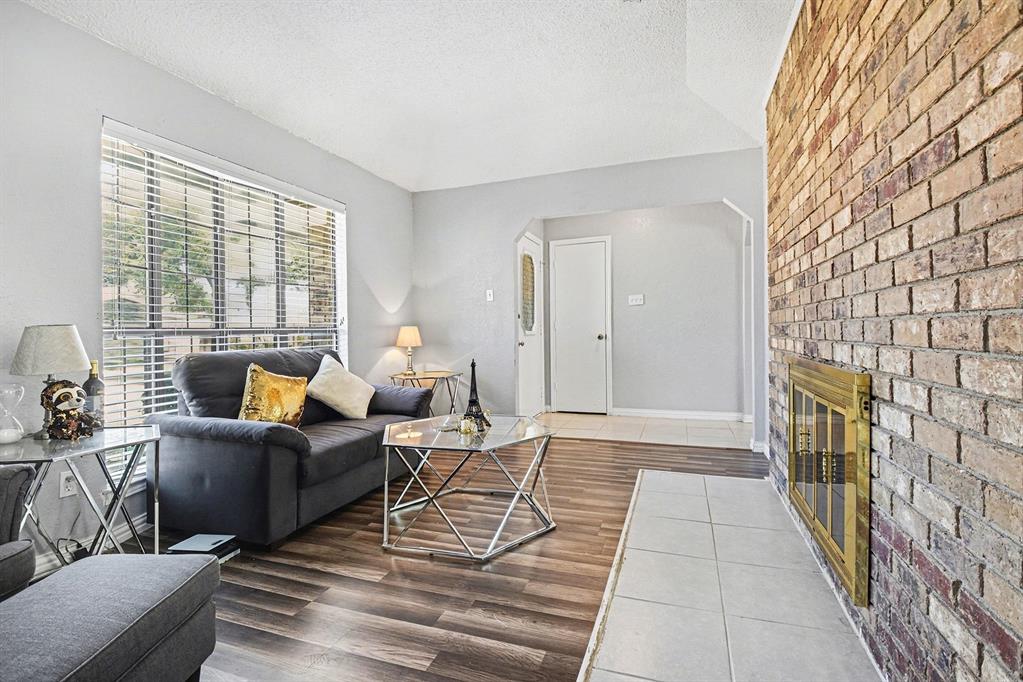 2433 Hallmark Street Grand Prairie, TX 75052 - Photo 4 of 15 a living room with furniture and a window