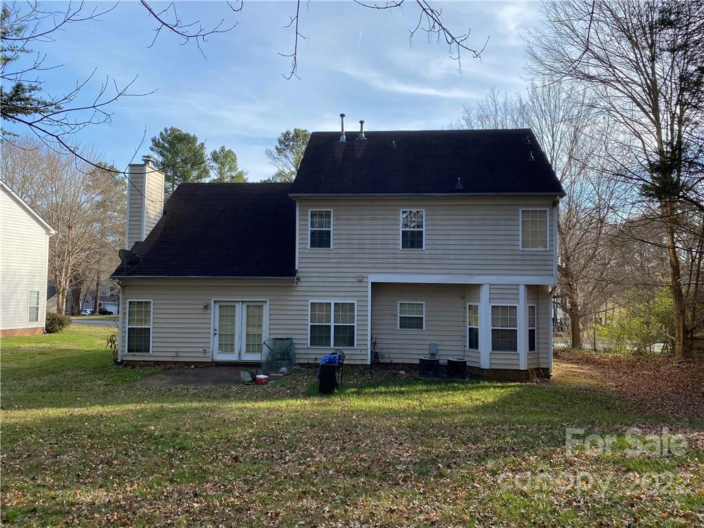 7306 Reedy Creek Road Charlotte, NC 28215 - Photo 15 of 15 a view of a house with a yard
