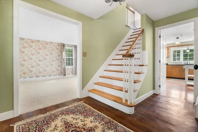 a view of an entryway with staircase