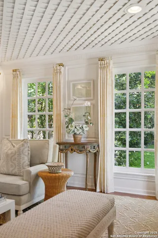 a kitchen with refrigerator cabinets and wooden floor