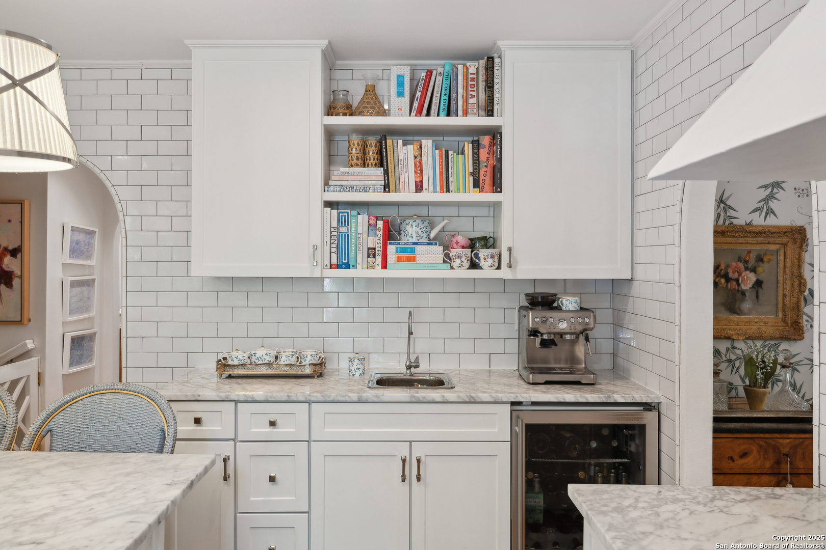 643 Terrell Road Terrell Hills, TX 78209 - Photo 26 of 60 a kitchen with cabinets and a wooden floor