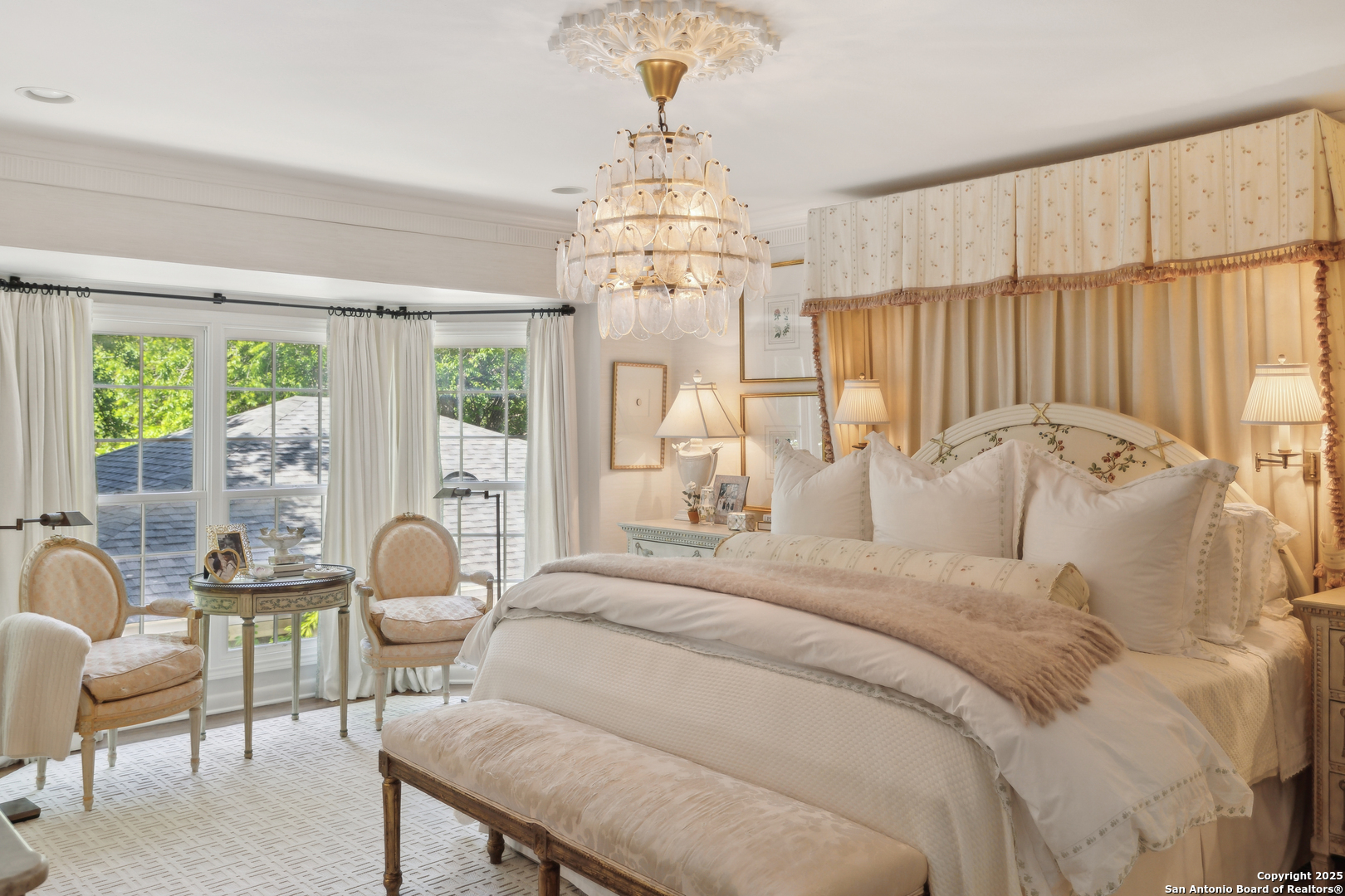 643 Terrell Road Terrell Hills, TX 78209 - Photo 29 of 60 a spacious bedroom with bed and a chandelier