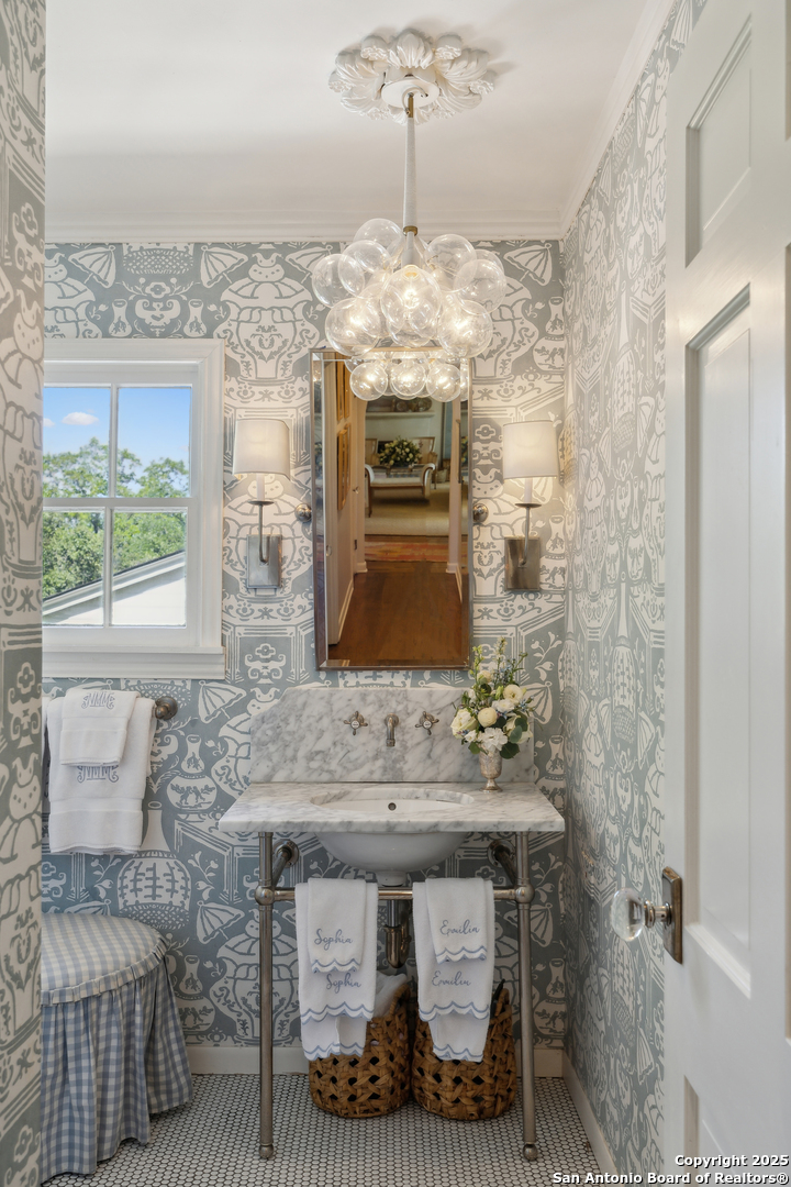643 Terrell Road Terrell Hills, TX 78209 - Photo 37 of 60 a bathroom with a sink and a mirror