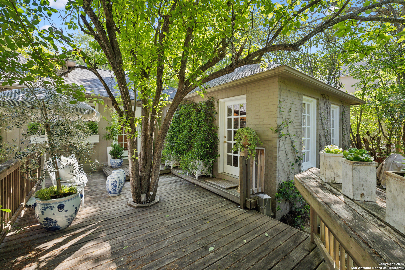 643 Terrell Road Terrell Hills, TX 78209 - Photo 48 of 60 a backyard of a house with seating space