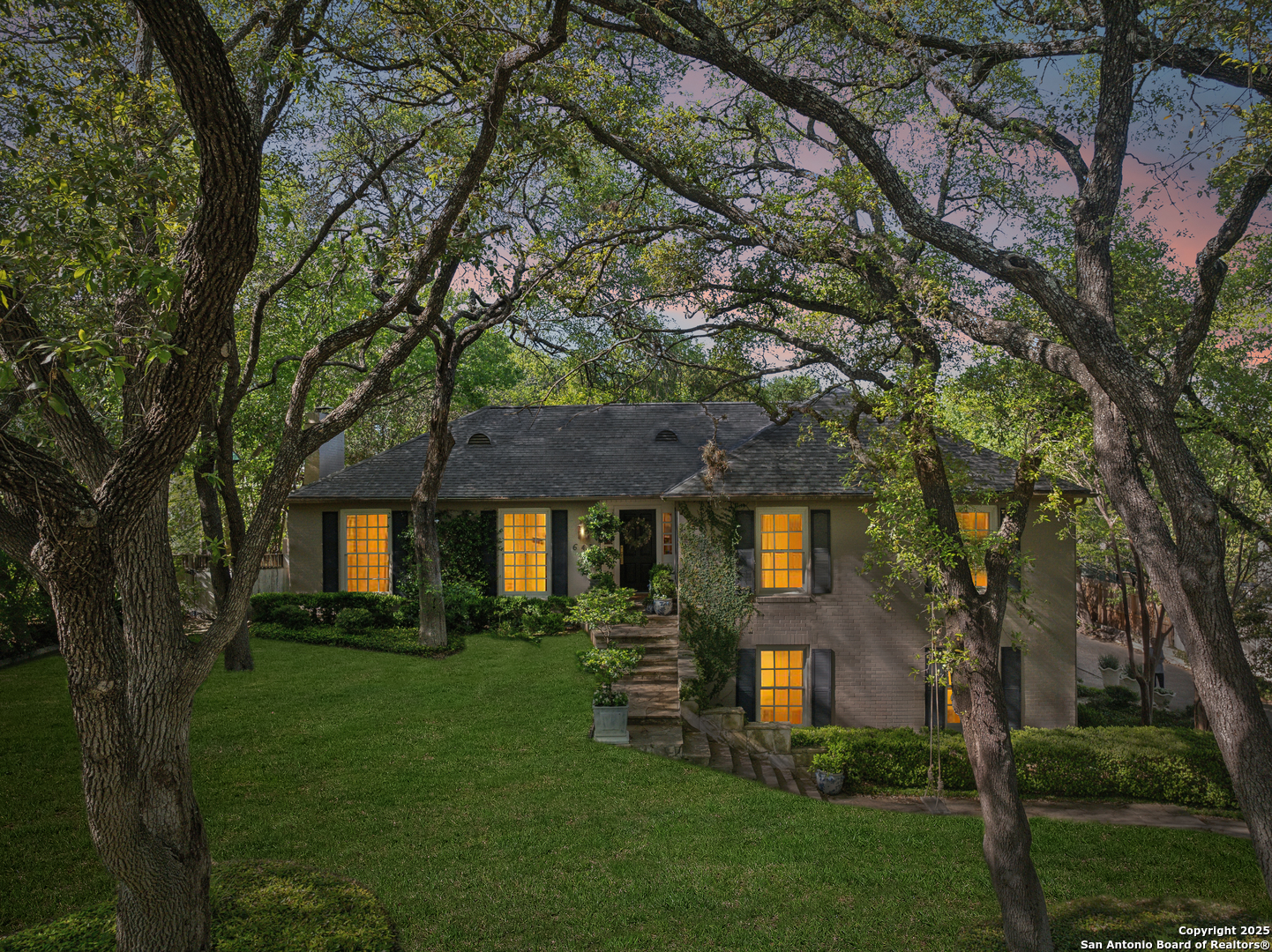 643 Terrell Road Terrell Hills, TX 78209 - Photo 52 of 60 a front view of a house with a garden