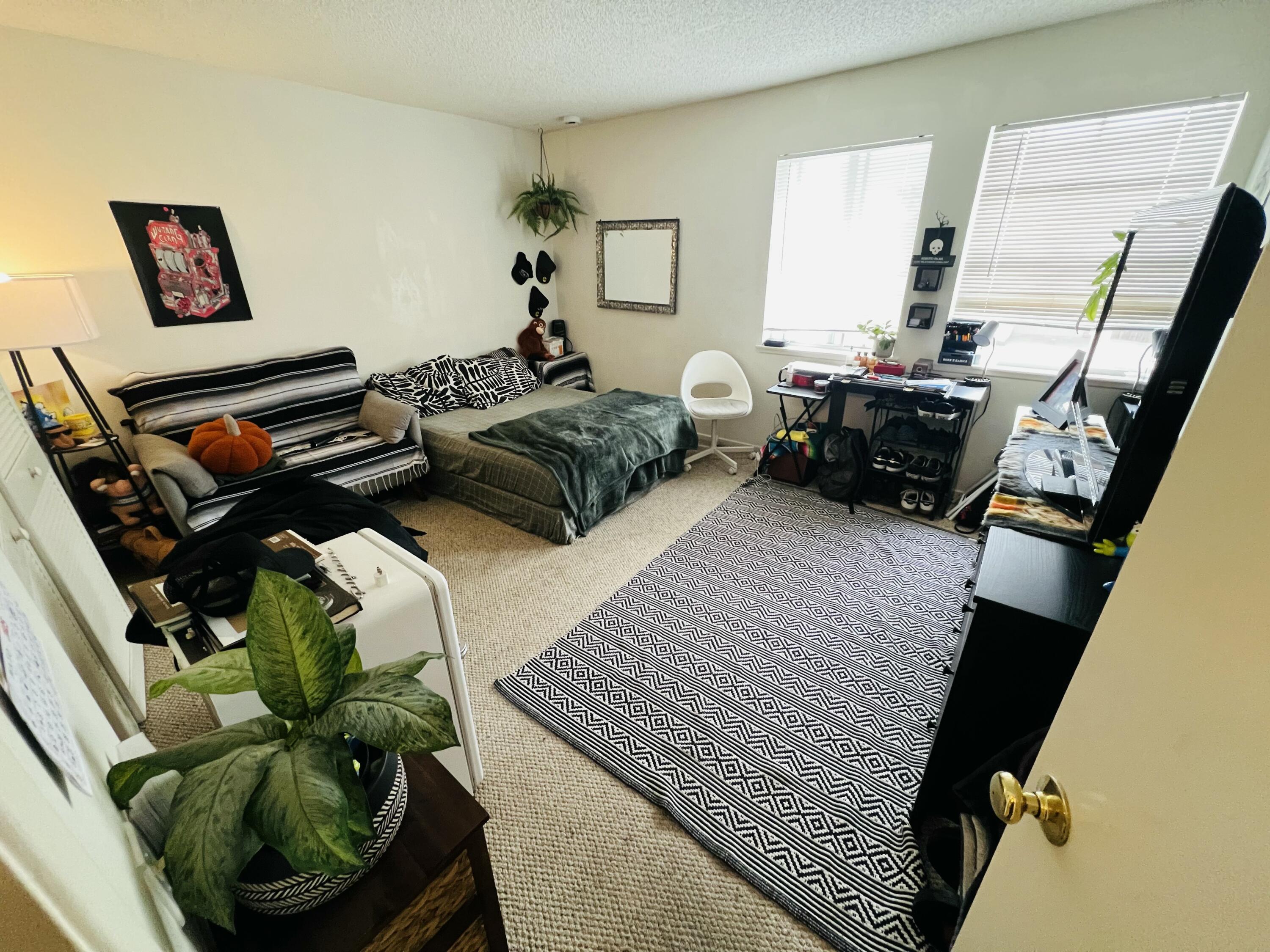 459 Linfield Place Goleta, CA 93117 - Photo 15 of 17 a bedroom with furniture and a large window