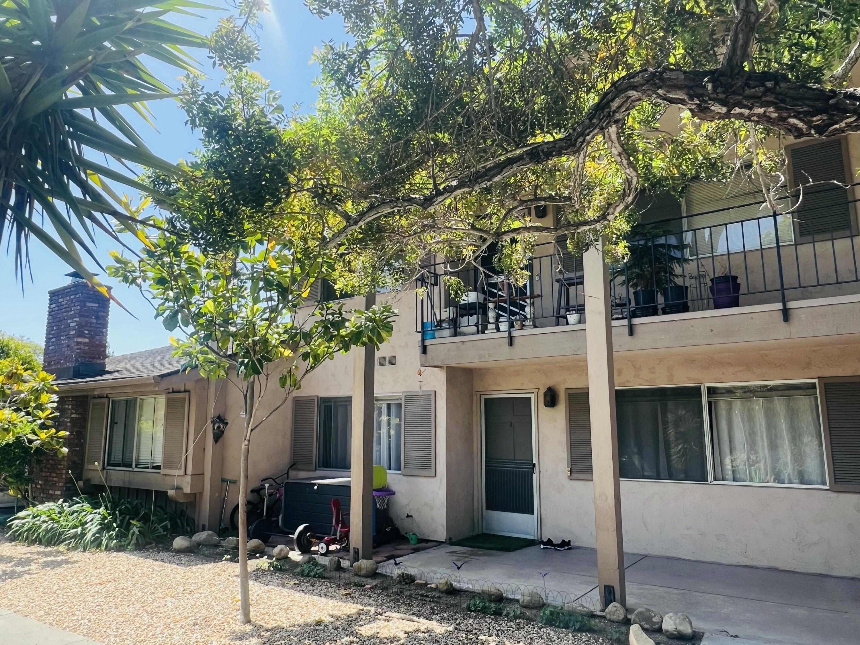 459 Linfield Place Goleta, CA 93117 - Photo 3 of 17 a front view of a house with a tree
