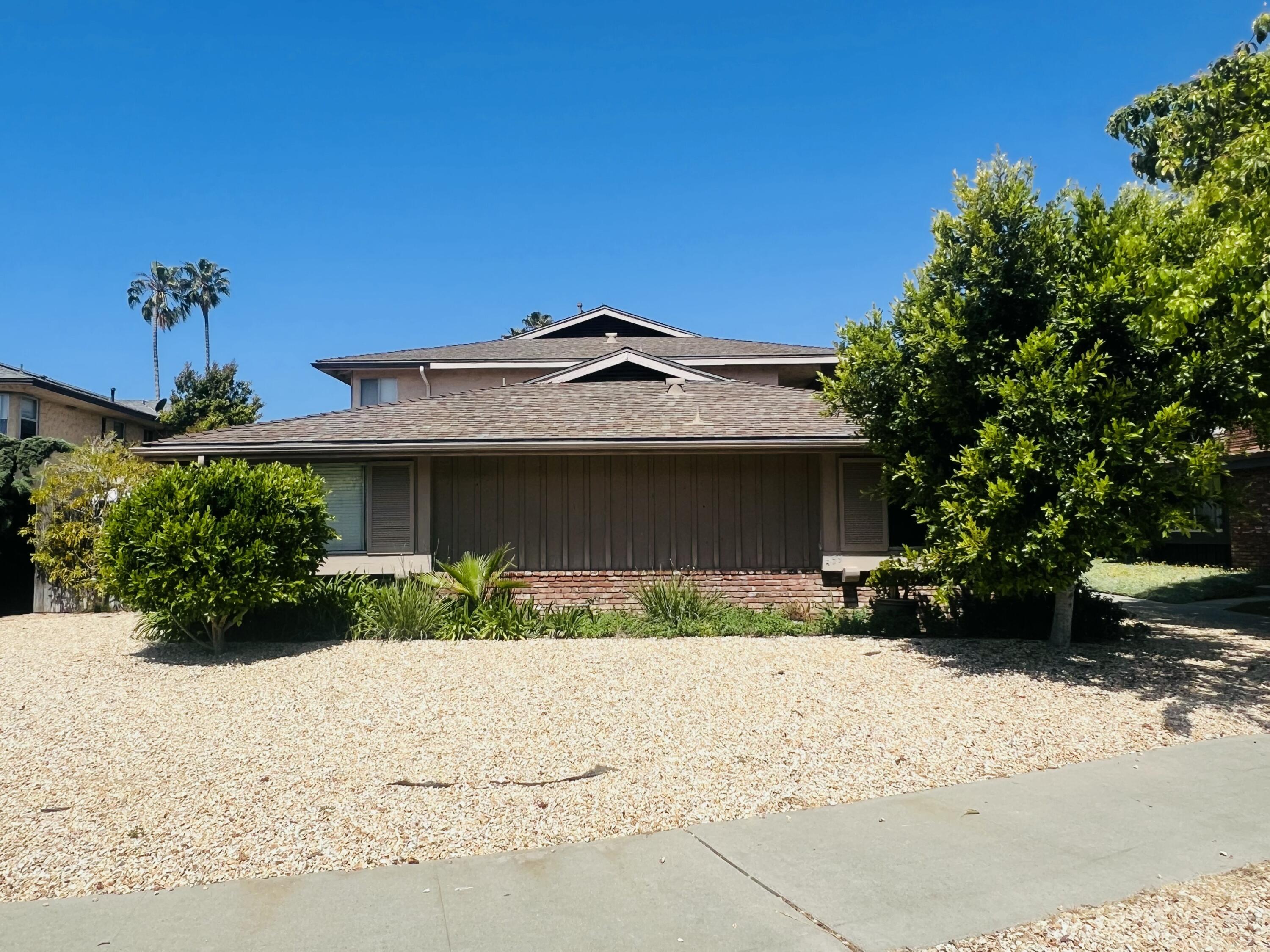459 Linfield Place Goleta, CA 93117 - Photo 5 of 17 a front view of a house with a yard