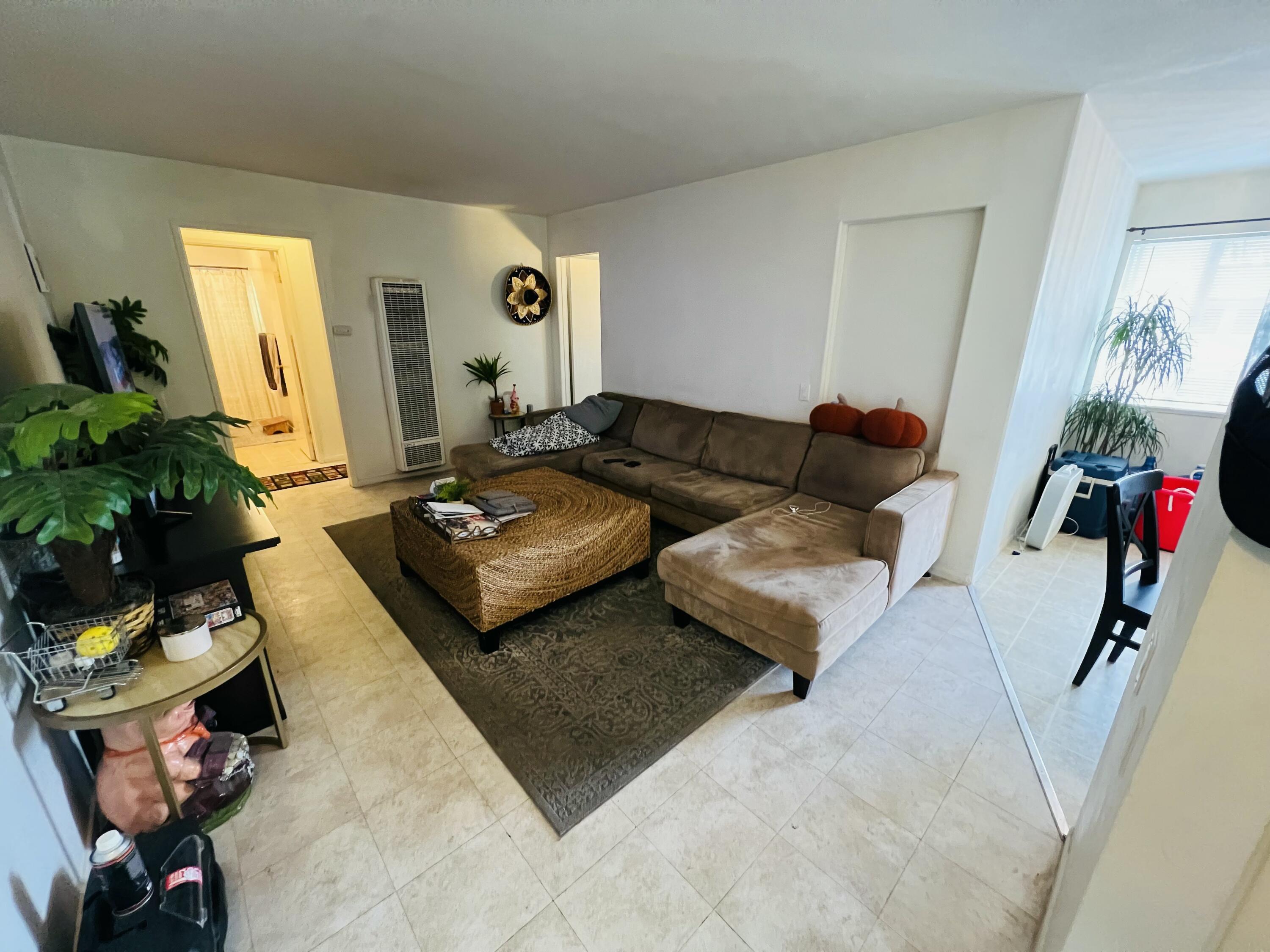 459 Linfield Place Goleta, CA 93117 - Photo 10 of 17 a living room with furniture and a couch