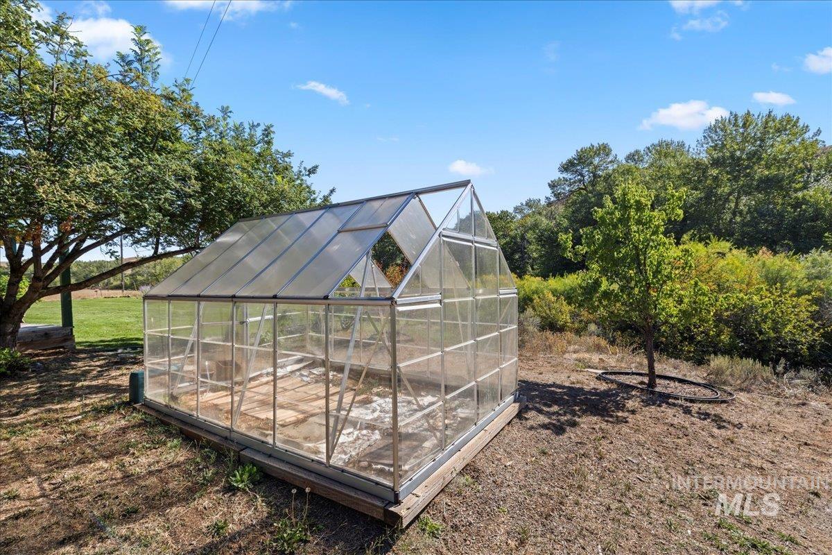2128 Jackson Creek Road Council, ID 83612 - Photo 43 of 50 View of greenhouse featuring a sunroom