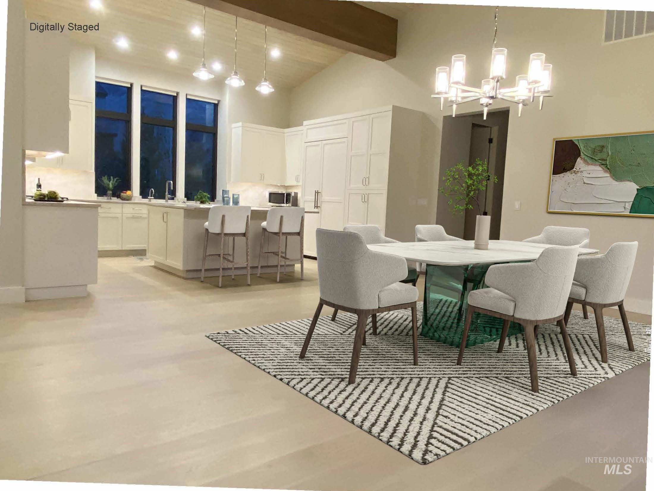 27 Streamside Drive Hailey, ID 83333 - Photo 6 of 39 DIGITALLY STAGED - Dining space with beam ceiling, a chandelier, high vaulted ceiling, and light wood-style floors
