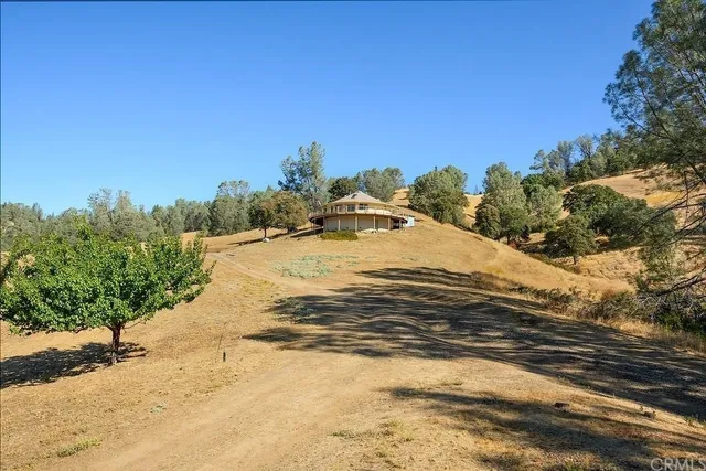 a view of a backyard of a house