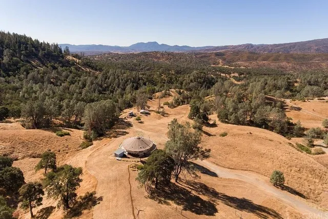 a view of a backyard of a house