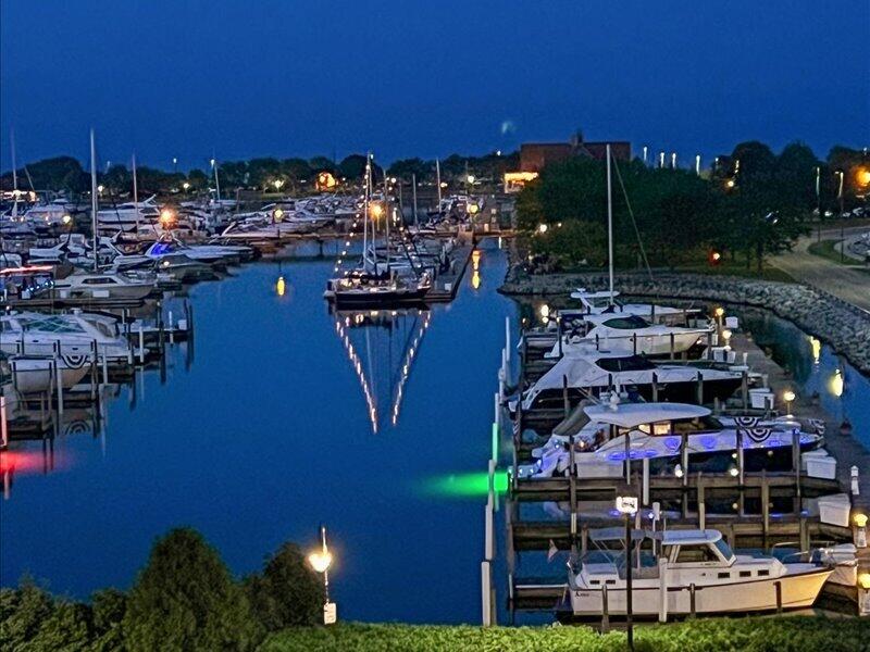 333 Lake Avenue, Unit 308 Racine, WI 53403 - Photo 1 of 51 Sunset View of Marina from Great Room