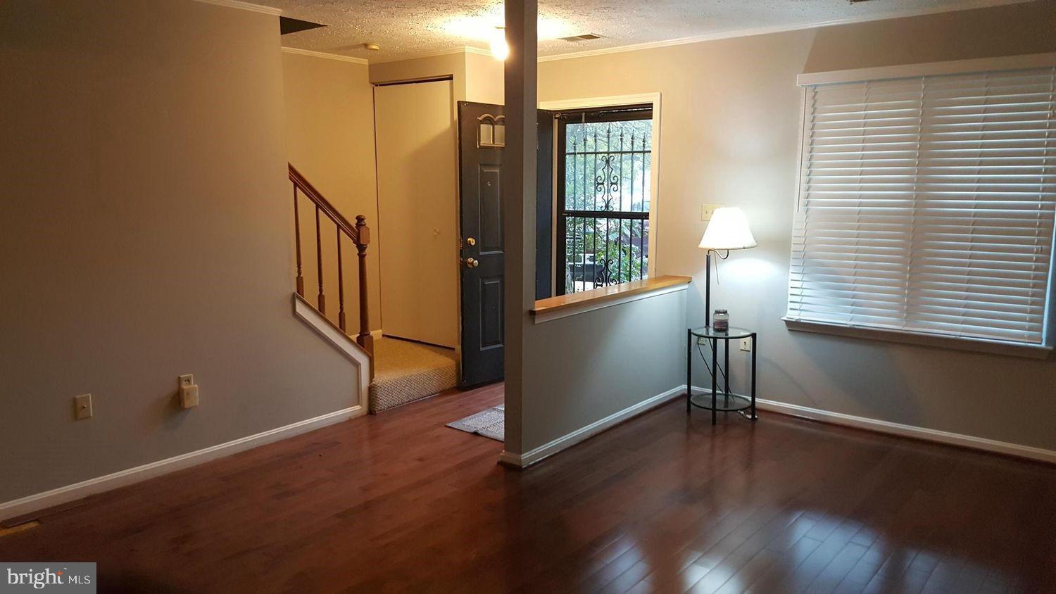 57 Riverside Run Drive Indian Head, MD 20640 - Photo 3 of 24 a view of entryway with wooden floor and stairs
