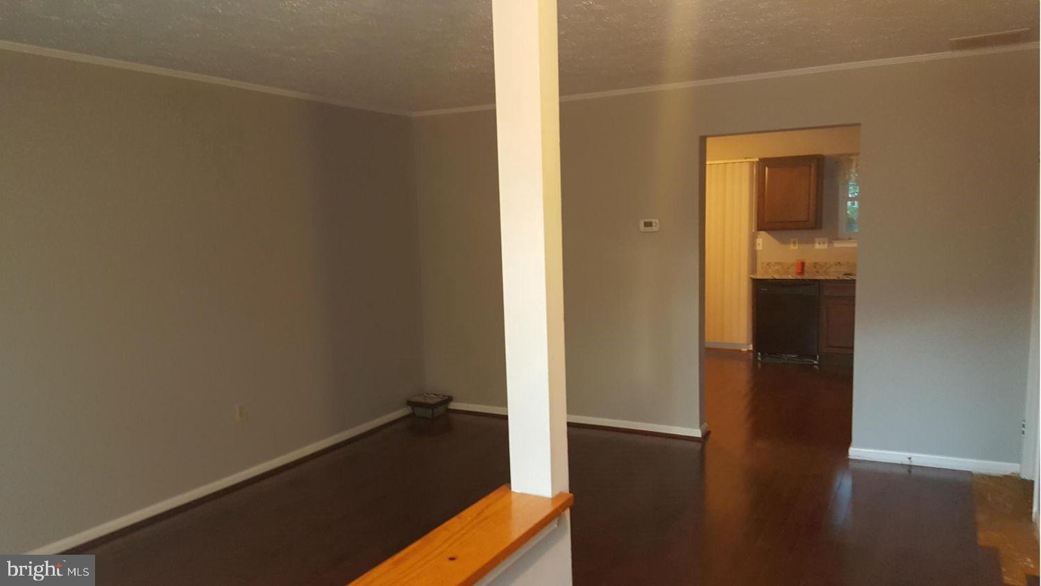 57 Riverside Run Drive Indian Head, MD 20640 - Photo 4 of 24 an empty room with wooden floor and closet