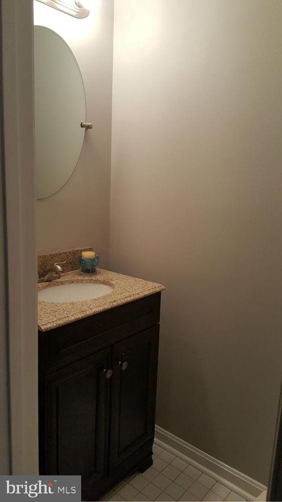 57 Riverside Run Drive Indian Head, MD 20640 - Photo 5 of 24 a bathroom with a sink and mirror