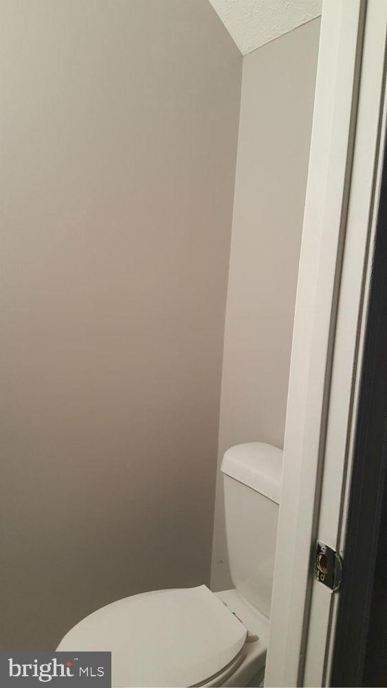 57 Riverside Run Drive Indian Head, MD 20640 - Photo 6 of 24 a white toilet sitting next to a small window