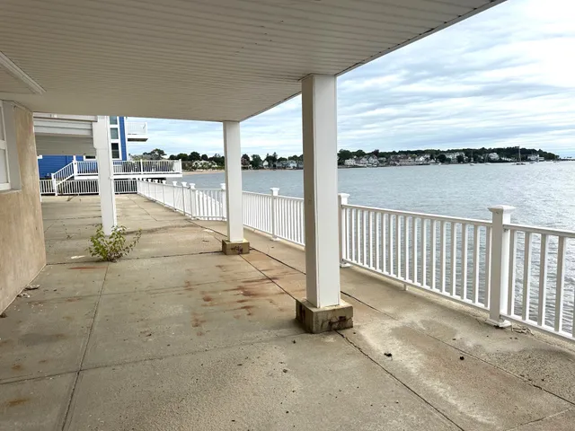 a view of a swimming pool with a porch