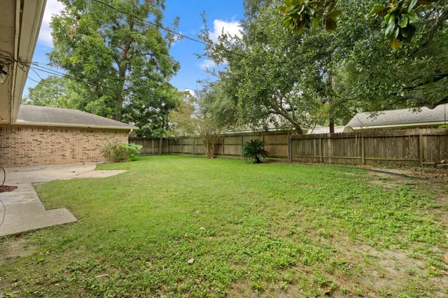 a view of a backyard with a small cabin