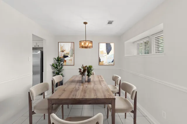 a view of a dining room with furniture