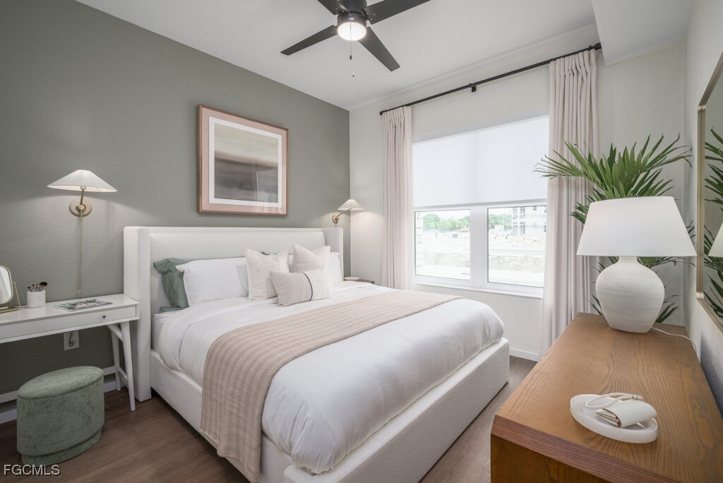 8552 Collier Boulevard, Unit RAVELLO Naples, FL 34114 - Photo 10 of 20 a bedroom with a bed and window