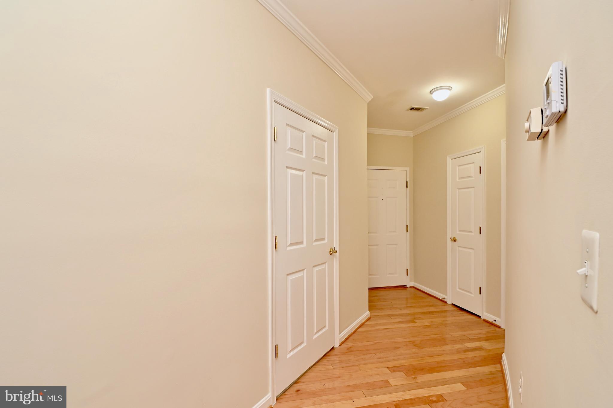 11775 Stratford House Place, Unit 104 Reston, VA 20190 - Photo 6 of 34 a view of a hallway