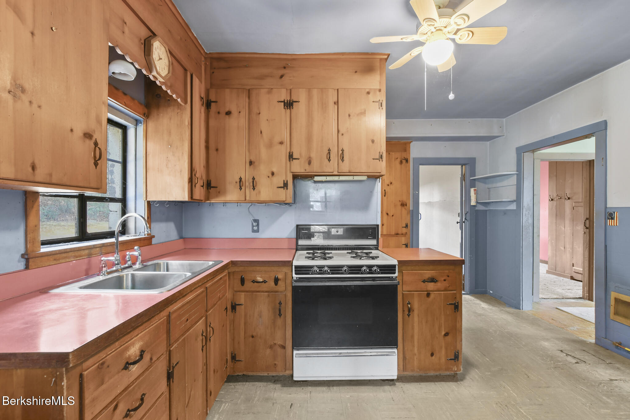8 Tannery Road Sandisfield, MA 01255 - Photo 16 of 37 a kitchen with stainless steel appliances granite countertop a sink a stove and a refrigerator