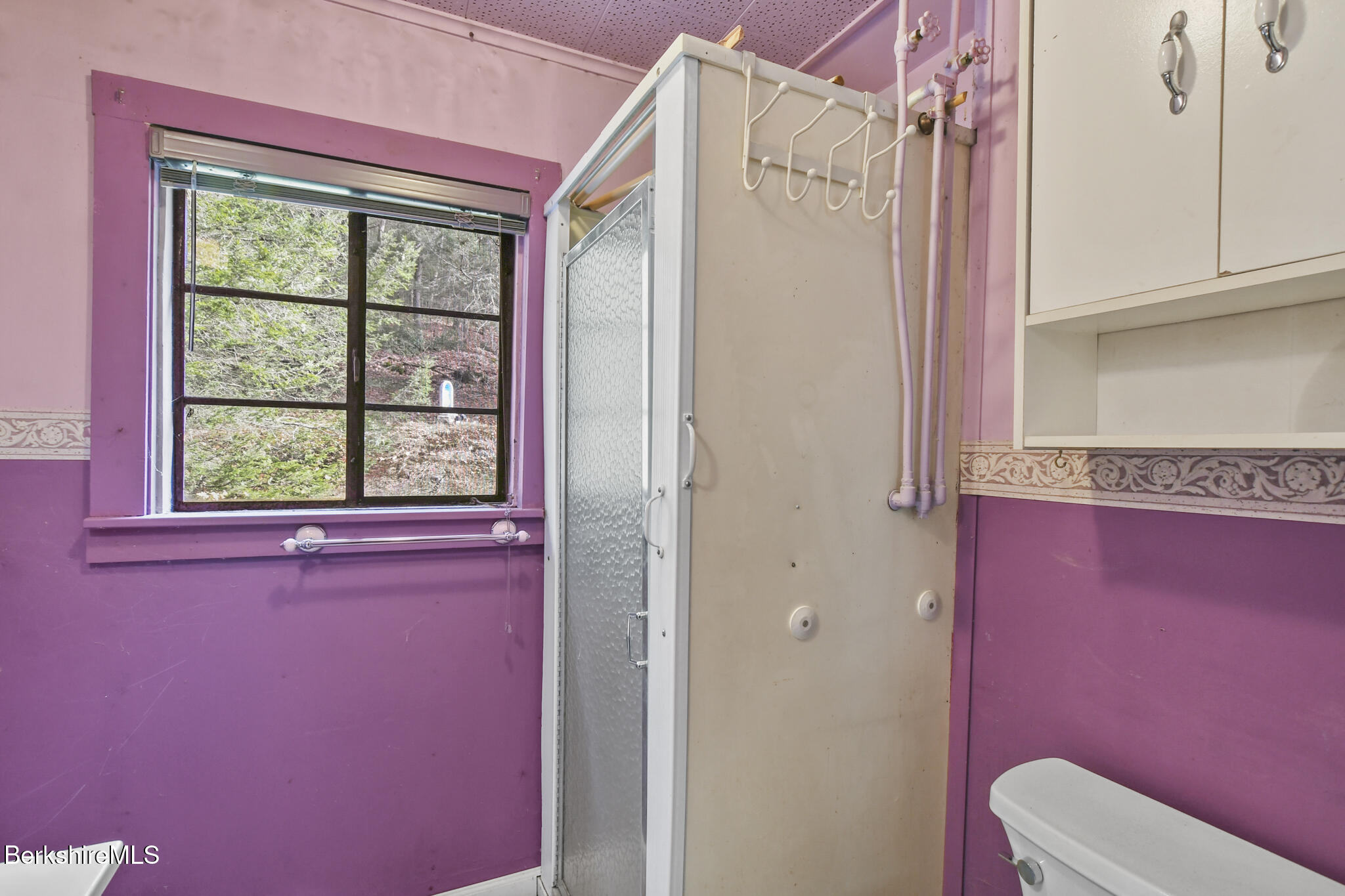 8 Tannery Road Sandisfield, MA 01255 - Photo 18 of 37 a bathroom with a window a toilet and a shower
