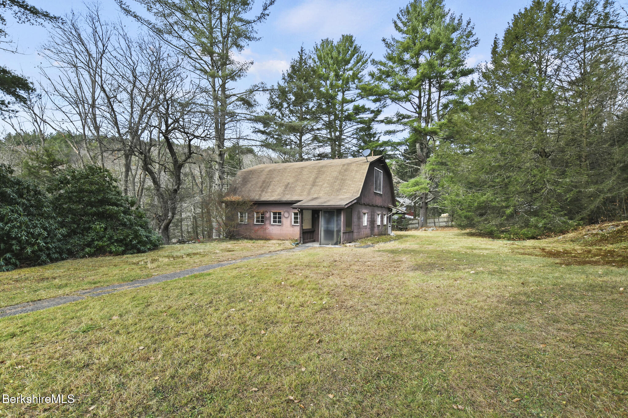 8 Tannery Road Sandisfield, MA 01255 - Photo 25 of 37 a view of a house with a yard and sitting area