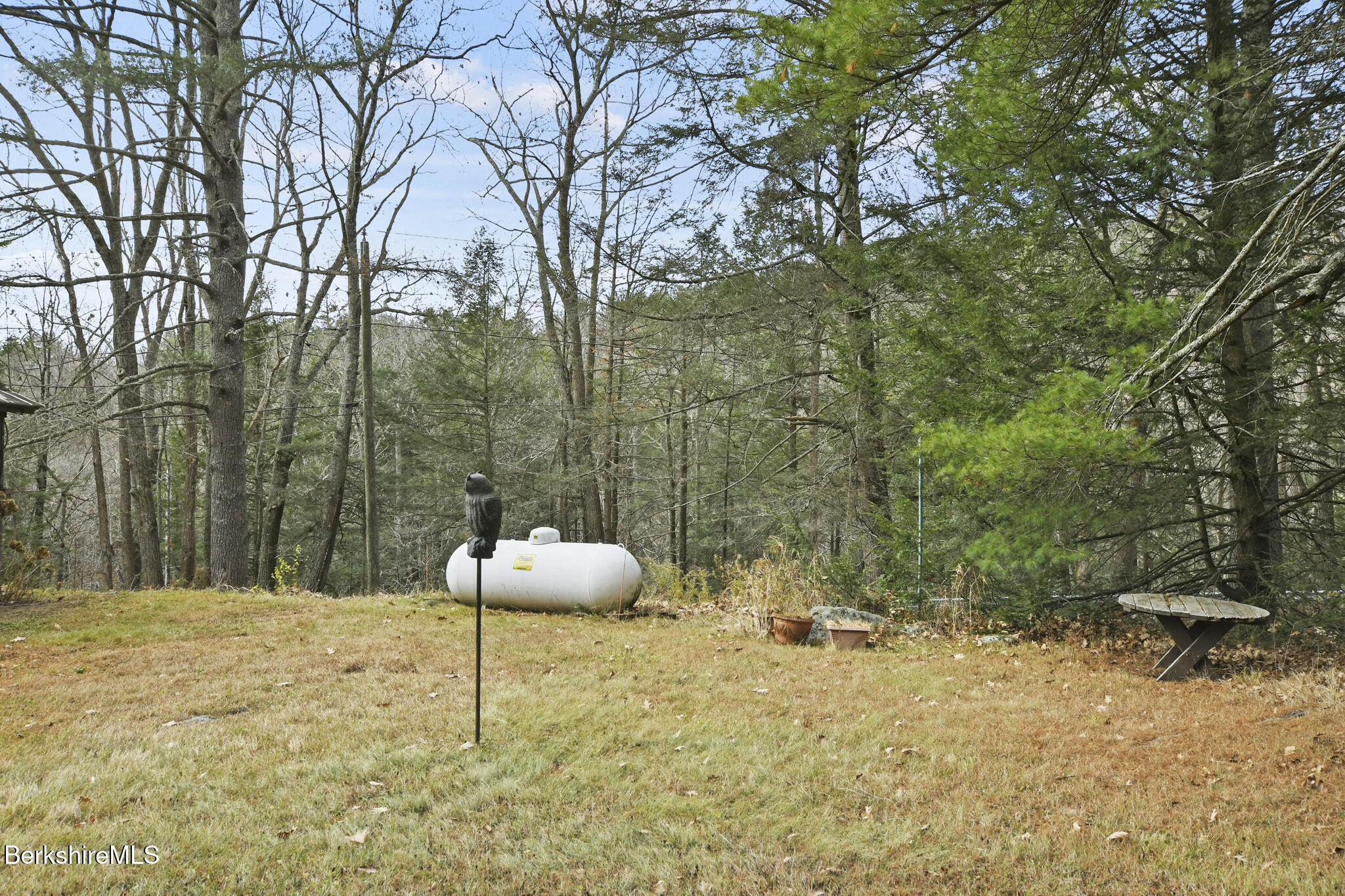 8 Tannery Road Sandisfield, MA 01255 - Photo 30 of 37 a backyard of a house with table and chairs