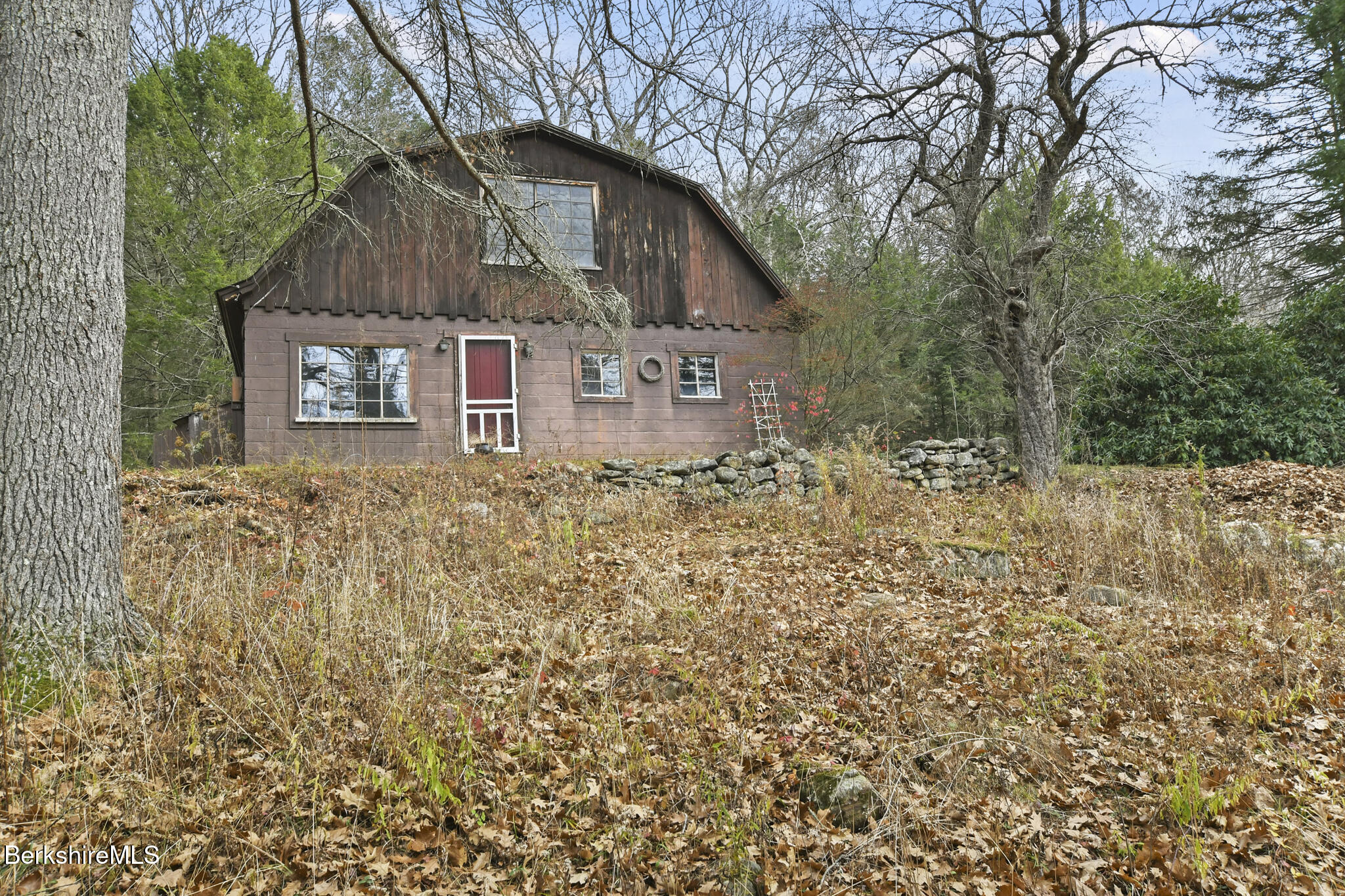 8 Tannery Road Sandisfield, MA 01255 - Photo 33 of 37 a front view of a house with a yard