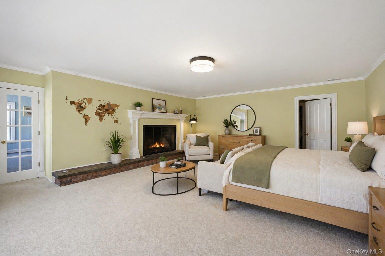235 Centre Island Road Centre Island, NY 11771 - Photo 12 of 32 a bedroom with a bed and a chair