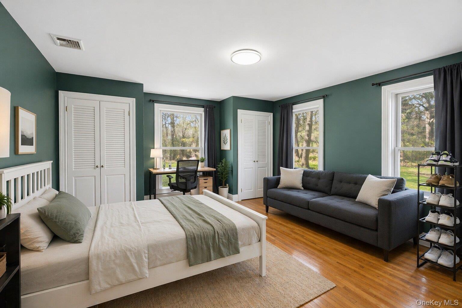 235 Centre Island Road Centre Island, NY 11771 - Photo 20 of 32 a bedroom with furniture and a large window