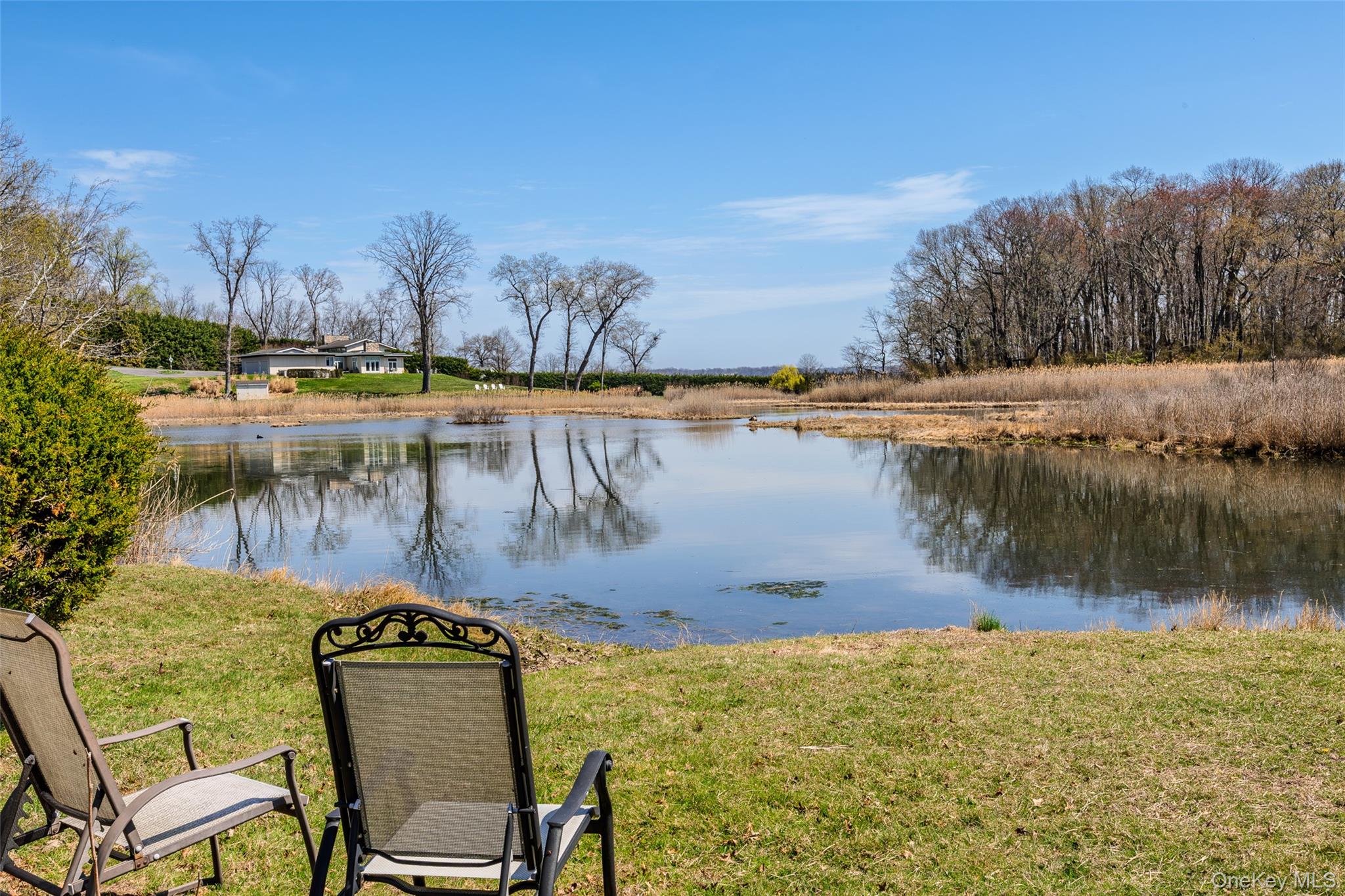 235 Centre Island Road Centre Island, NY 11771 - Photo 29 of 32 a view of a lake with outdoor space