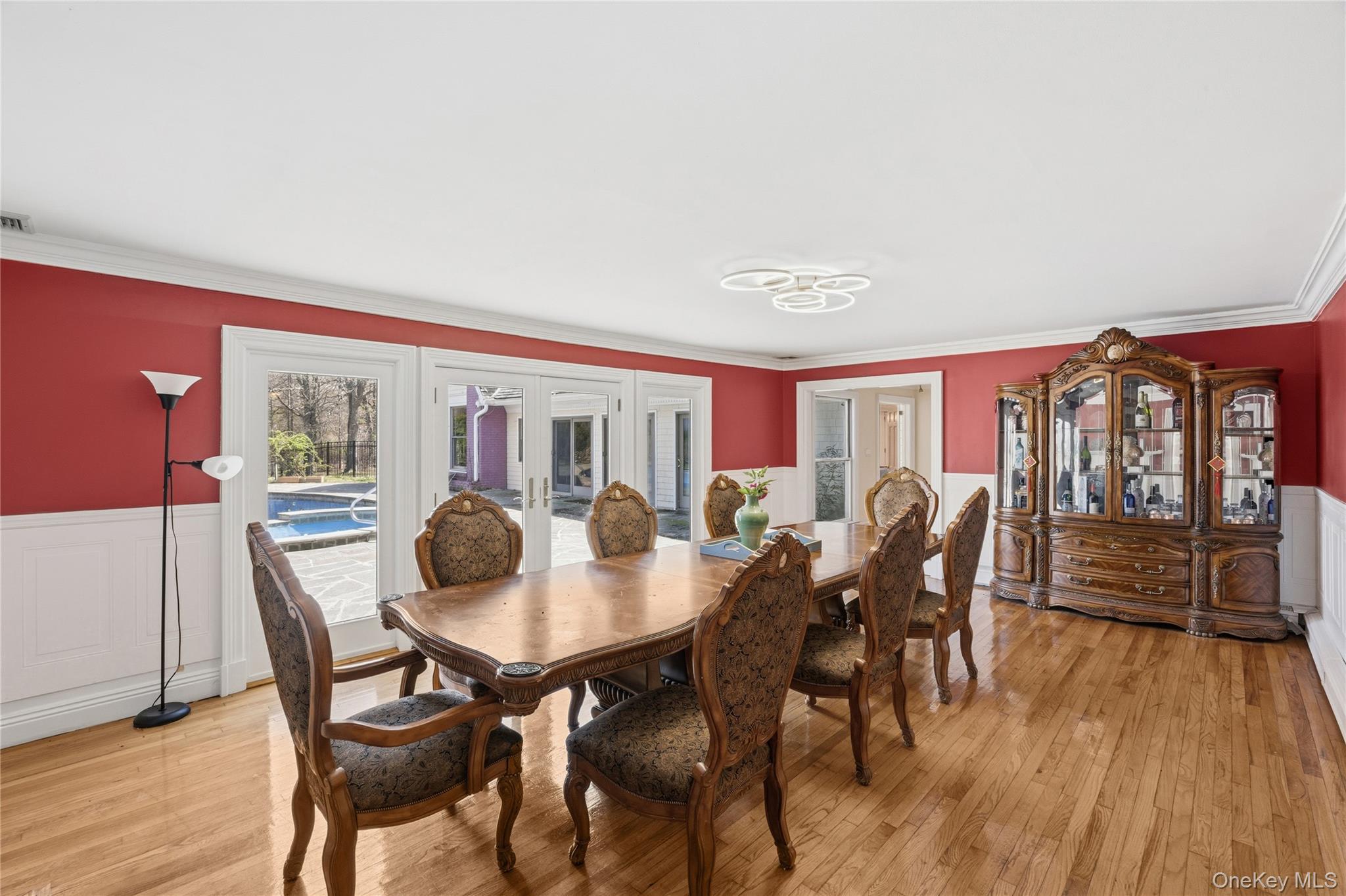 235 Centre Island Road Centre Island, NY 11771 - Photo 7 of 32 a dining room with furniture and wooden floor