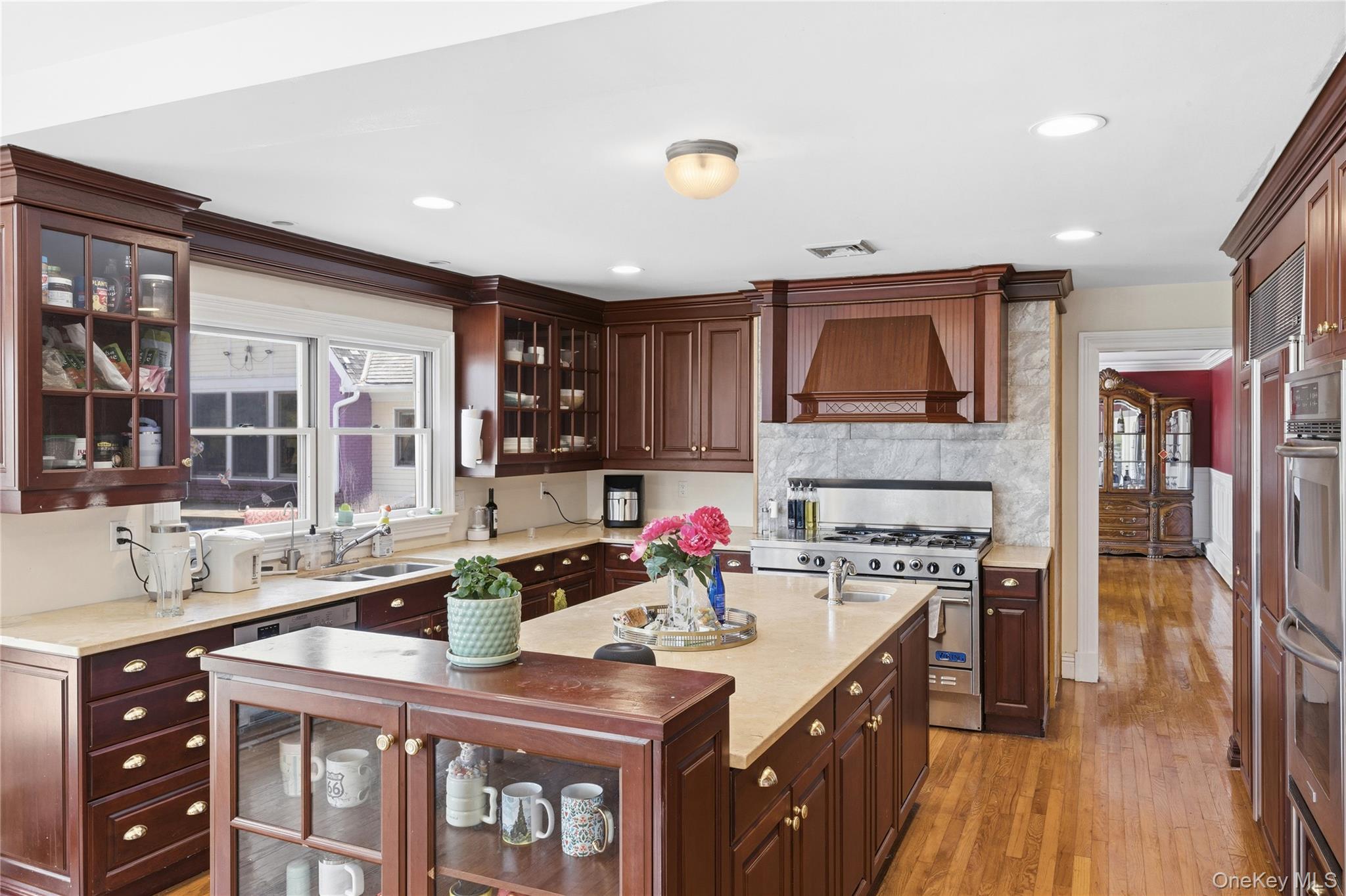 235 Centre Island Road Centre Island, NY 11771 - Photo 9 of 32 a kitchen with stainless steel appliances granite countertop a sink stove and cabinets